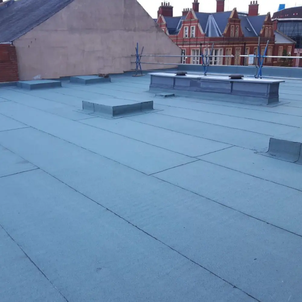 Commercial single-ply membrane being installed on a Newcastle warehouse roof